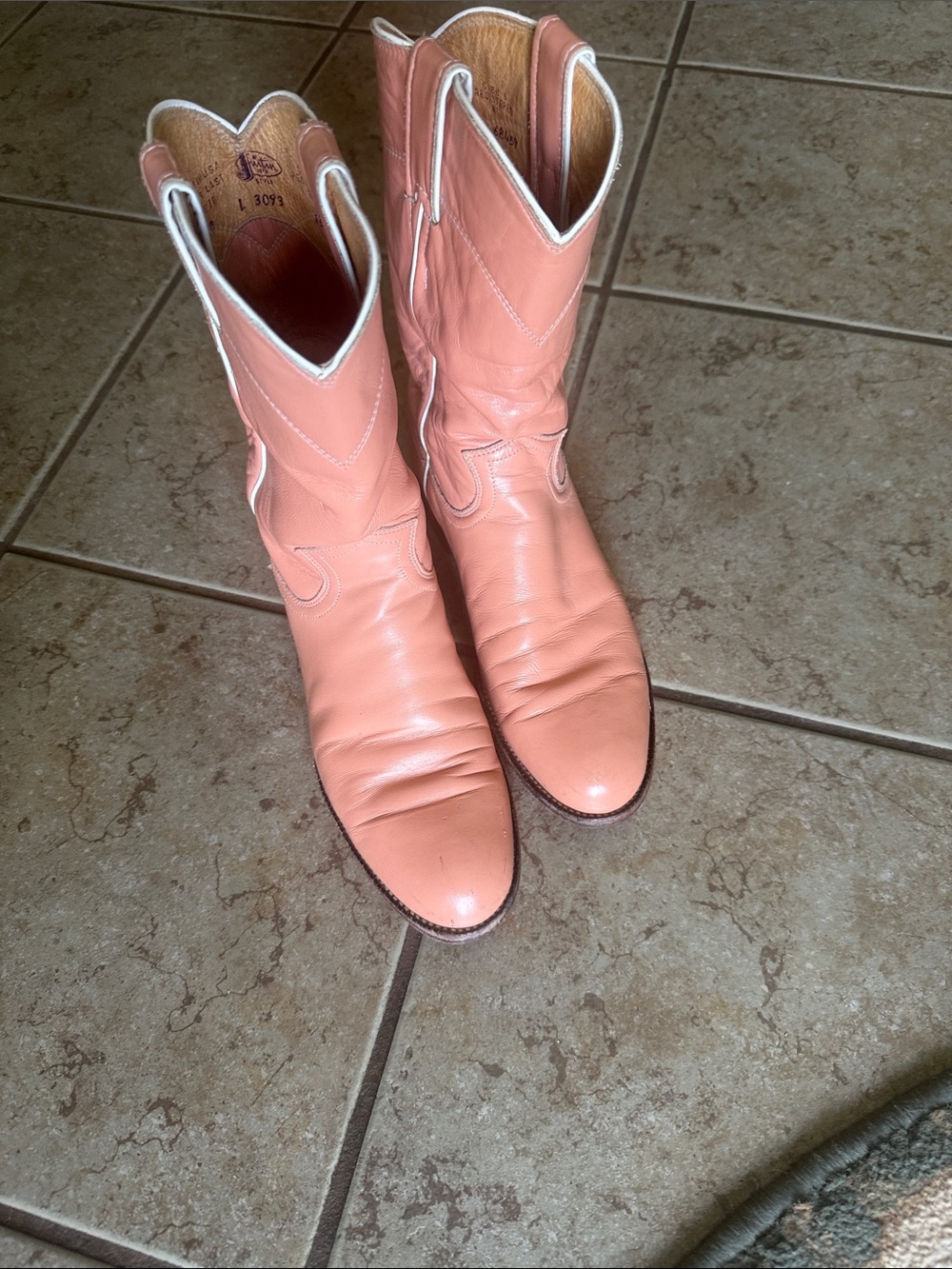 vintage light pink leather roper cowboy boots from Justin, styled with contrast